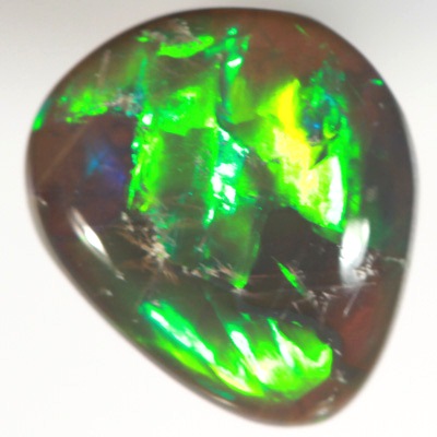 SOLID BLACK OPAL Very bright rolling flashes, neon copper orange and green